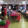 Photo of parishioners getting food during the parish picnic