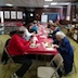 Photo of parish and veterans enjoying a breakfast honoring local veterans