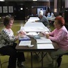 Photo of parishioners writing out Easter cards after the Pascha baking class