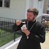 Photo of Fr. Ignatius eating ice cream at the annual_picnic