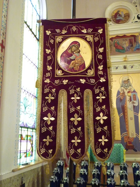 Photo of a banner with an icon of Mother Mary and baby Jesus
