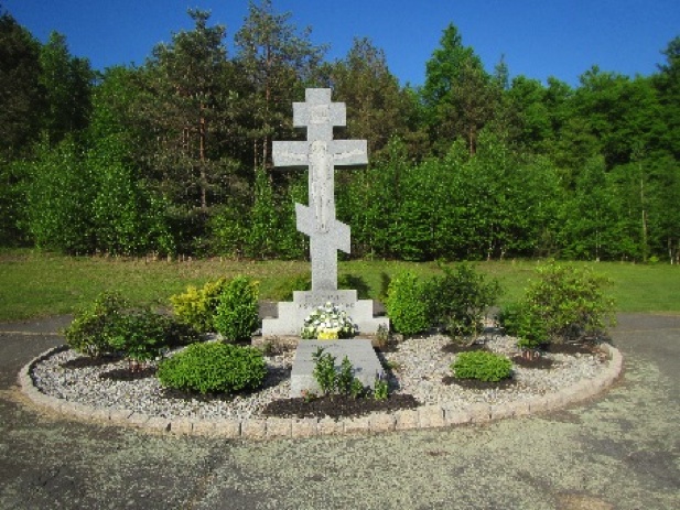 Photo of cross marking Father Dedick's grave site.