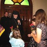 Photo of parishoners greeting His Grace Bishop Mark