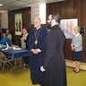 Photo of His Grace, Bishop Mark giving the Blessing at lunch