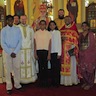 Photo of Bishop Mark with Fr. Edward and family