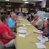 Photo of Bishop Mark with Fr. Edward and family