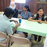 Photo of Bishop Mark with Fr. Edward and family