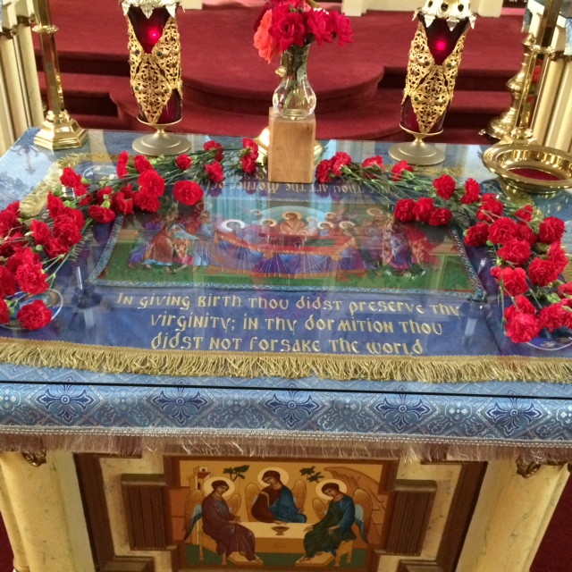 Photo of flowers around Dormition icon