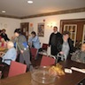Photo of parishioners visiting with residents of Serenity Gardens