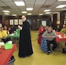 Photo of Father Hatfield and parishioners