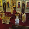 Wide view of Archbishop Mark speaking during the Diving Liturgy service