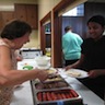 Photo of parishioners socializing during the parish picnic