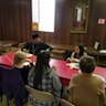 Photo of parish and veterans enjoying a breakfast honoring local veterans