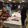 Photo of parish and veterans enjoying a breakfast honoring local veterans