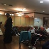 Photo of parish and veterans enjoying a breakfast honoring local veterans