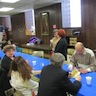 Photo of parishioners and guests enjoying food and fellowship