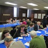 Photo of parishioners and guests enjoying food and fellowship