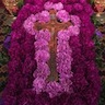 Photo of the Holy Cross surrounded by flowers