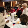 Photo of parishioners preparing dough during the Pascha baking class