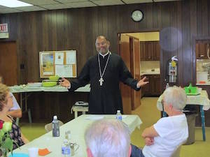 Photos from our farewell luncheon for Father John and family