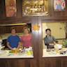 Photo of parishioners baking cookies for residents of Serenity Gardens Nursing Home.