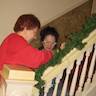 Photo of parishioners decorating inside the church for Christmas.