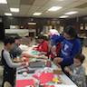 Photo of parish youth making gift boxes