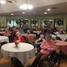 Photo of nursing home residents enjoying Christmas carols