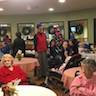 Photo of nursing home residents enjoying Christmas carols