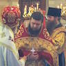 Photo of Fr. Ignatius being awarded the Diocesan Purple Skufia for his service