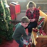 Photo of parishoners decorating the Christmas tree