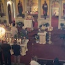 Photo of Fr. Vjekoslav reading from the Holy Bible during Pascha