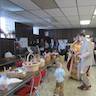 Photo Fr. Vjekoslav blessing Pascha baskets in the church hall