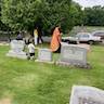 Photo of Father Vjekoslav blessing gravesites at St. Michael's Cemetary