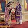Photo of His Eminence, Archbishop Mark presenting Father Vjekoslav with the Skufia