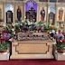 Photo of the Epitaphios (tomb icon), surrounded by flowers.