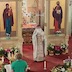 Photo Fr. Barnabas emerging from behind the alter, holding the Holy Gifts during the Pascha liturgy service.