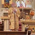 Photo of Archbiship Mark, who is standing in front of the iconostas while speaking to the congregation.